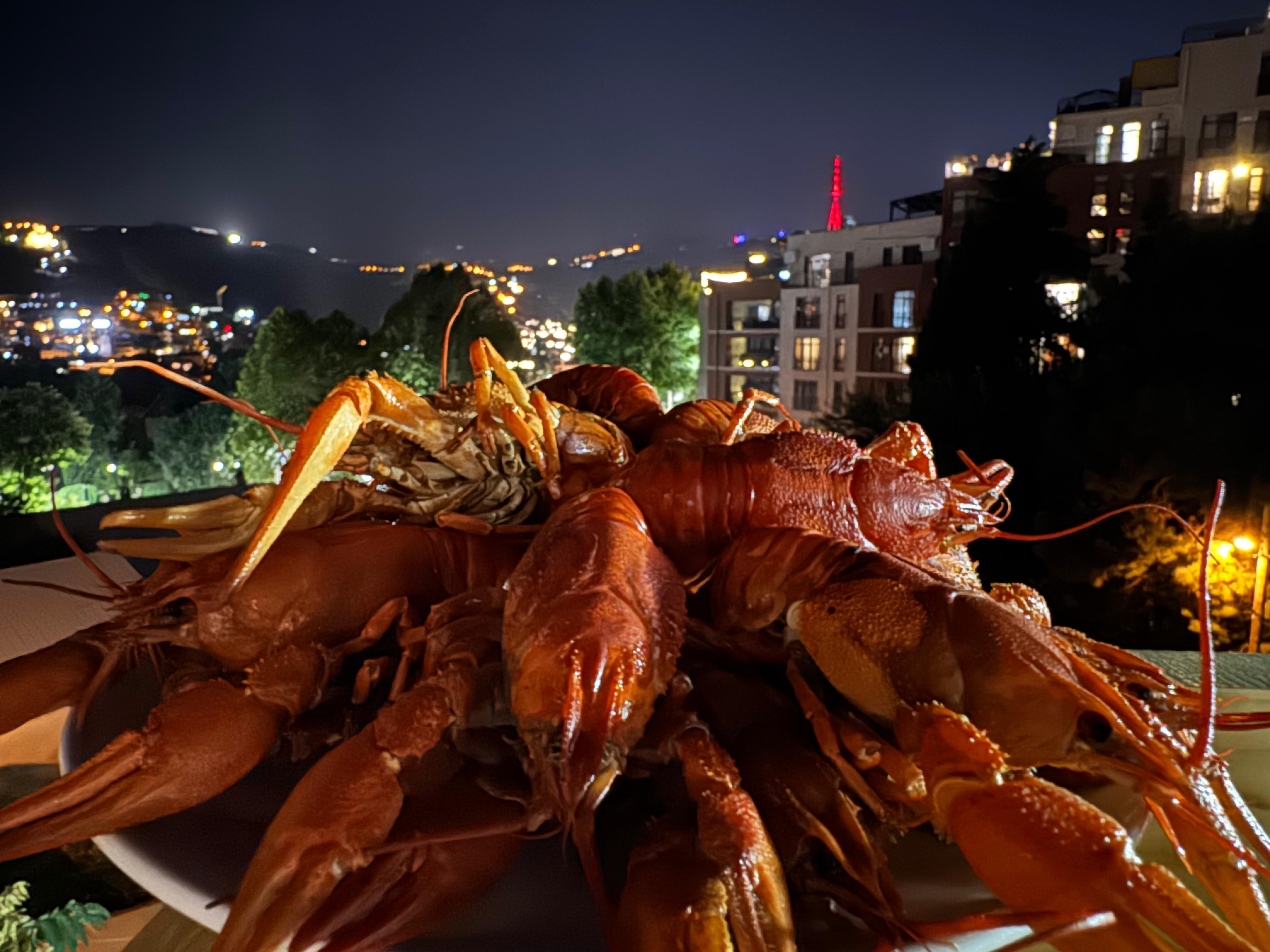 Freshly cooked crayfish, with a stunning night view - Los Crayfish Hermanos 2026 season